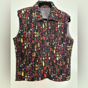 Colorful reversible vest, size large.